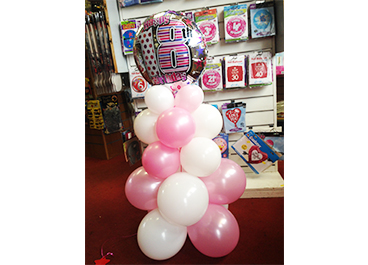 Latex balloon pillar with foil balloon on top