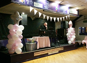 Latex balloon pillars with foil balloon tops